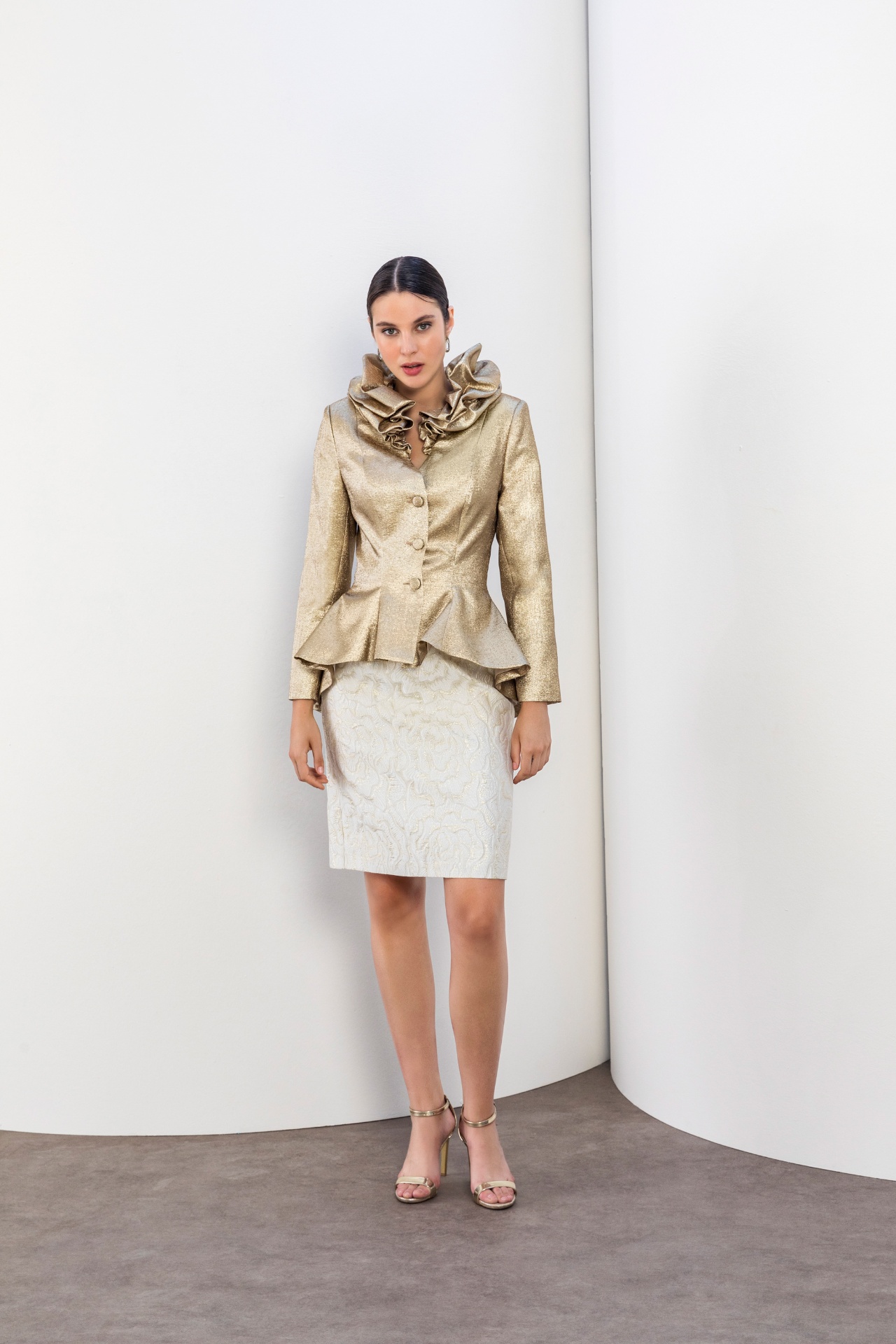 Gold ruffle-collar peplum jacket with ivory jacquard pencil skirt