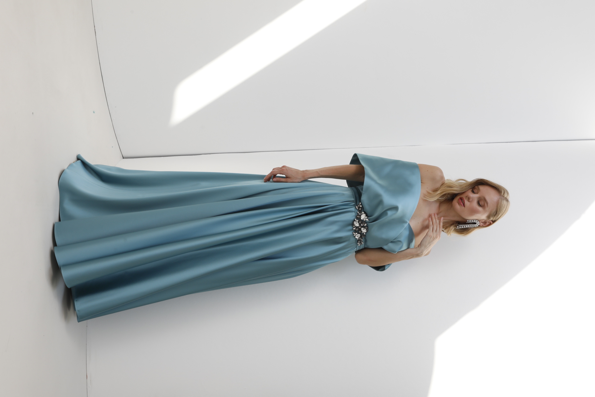 Dusty blue satin off-shoulder A-line gown with crystal floral belt