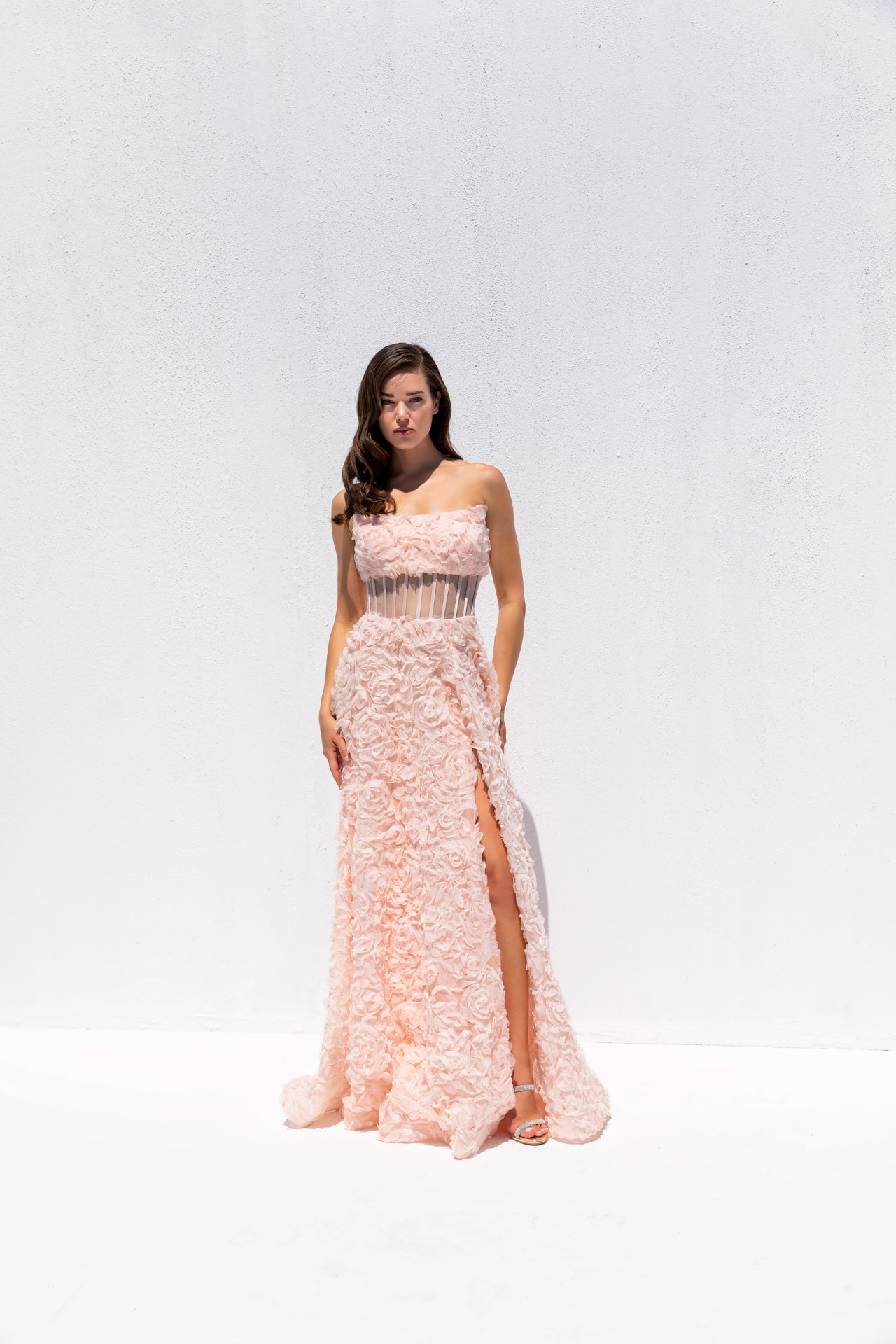 Blush pink 3D rosette gown with sheer corset bodice and high slit
